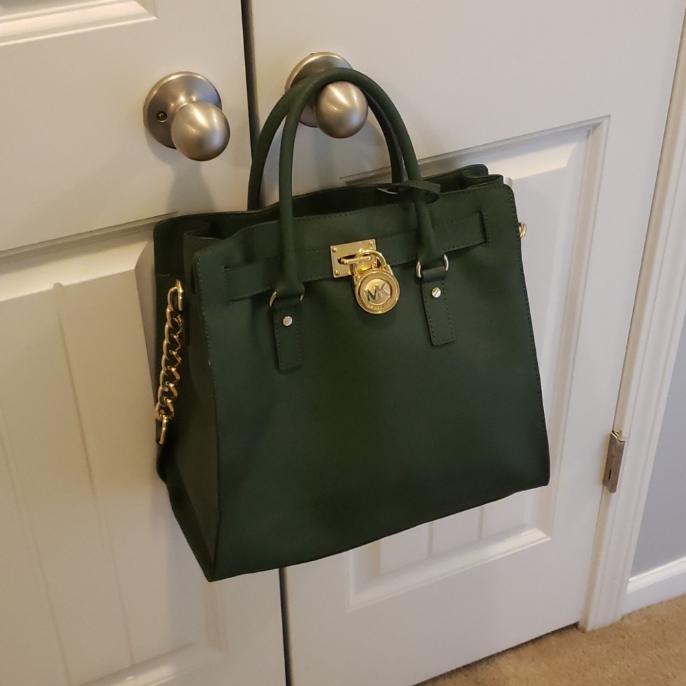 Green Michael Kors bag with gold hardware